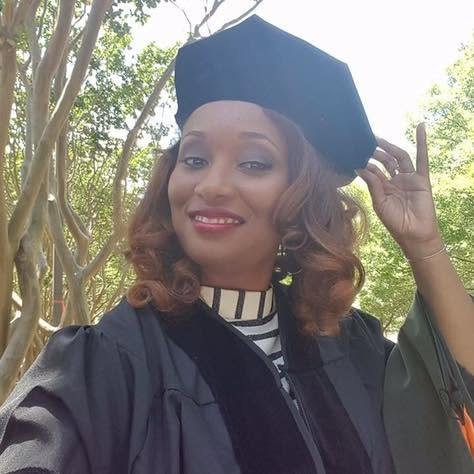 Lorraine in her cap and gown at her Doctor of Pharmacy graduation